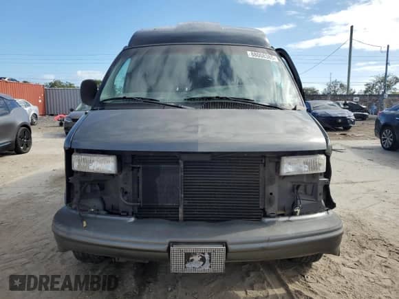 2000 Chevrolet Express Cargo YF7 with VIN 1GBFG15RXY1264551, listed as a Copart auction lot 88008385 with 206,407 mi miles and Salvage title. Bid and sale history available at DreamBid. Image 5.