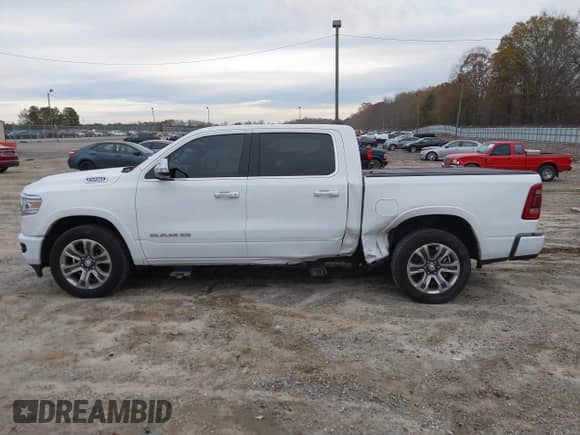 2021 Ram 1500 Longhorn z VIN 1C6SRFKT0MN824315, wystawiony jako IAAI lot #41079904 z przebiegiem 63 267 mil mil oraz . Historia ofert i sprzedaży dostępna na DreamBid. Obrazek 14.