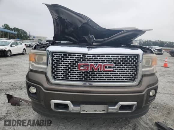 2015 GMC Sierra 1500 Denali с VIN 3GTU2WEJ1FG351469, выставлен на аукционе Copart как лот 69177645 с пробегом Не указан миль и Списание • Salvage title. История ставок и продаж доступна на DreamBid. Изображение 5.