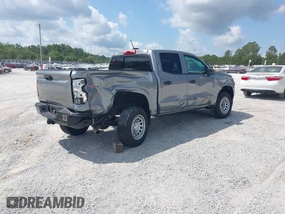 2023 Chevrolet Colorado 4WD Work Truck z VIN 1GCPTBEK7P1112228, wystawiony jako IAAI lot #42308344 z przebiegiem 12 668 mil mil oraz . Historia ofert i sprzedaży dostępna na DreamBid. Obrazek 4.