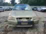 2002 Hyundai Accent GL z VIN KMHCG45C02U296132, wystawiony jako Copart lot #59401835 z przebiegiem 115 421 mil mil oraz Czysty tytuł • Clean title. Historia ofert i sprzedaży dostępna na DreamBid. Obrazek 5.