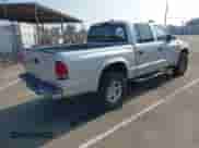 2004 Dodge Dakota Sport with VIN 1D7HG38K44S732251, listed as a IAAI auction lot 43536264 with 139,413 mi miles and . Bid and sale history available at DreamBid. Image 4.