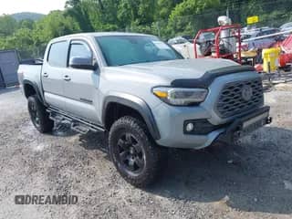 2021 Toyota Tacoma SR with VIN 3TMCZ5AN1MM399207, listed as a IAAI auction lot 42475374 with 107,167 mi miles and . Bid and sale history available at DreamBid. Image 1.