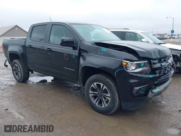 2021 Chevrolet Colorado 4WD Z71 z VIN 1GCGTDEN7M1282445, wystawiony jako IAAI lot #41737419 z przebiegiem 27 187 mil mil oraz . Historia ofert i sprzedaży dostępna na DreamBid. Obrazek 1.