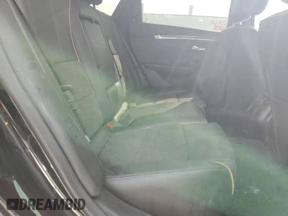 2015 Chevrolet Impala LT z VIN 1G1125S31FU148168, wystawiony jako Copart lot #82120405 z przebiegiem 139 724 mil mil oraz Szkoda całkowita • Salvage title. Historia ofert i sprzedaży dostępna na DreamBid. Obrazek 10.
