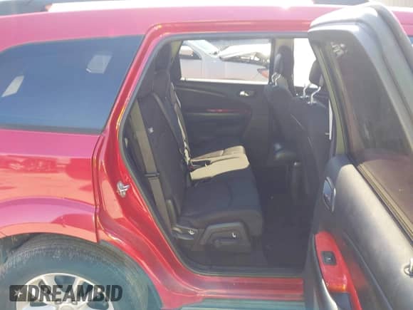 2015 Dodge Journey SXT z VIN 3C4PDCBG4FT734005, wystawiony jako IAAI lot #43561415 z przebiegiem 103 603 mil mil oraz . Historia ofert i sprzedaży dostępna na DreamBid. Obrazek 8.