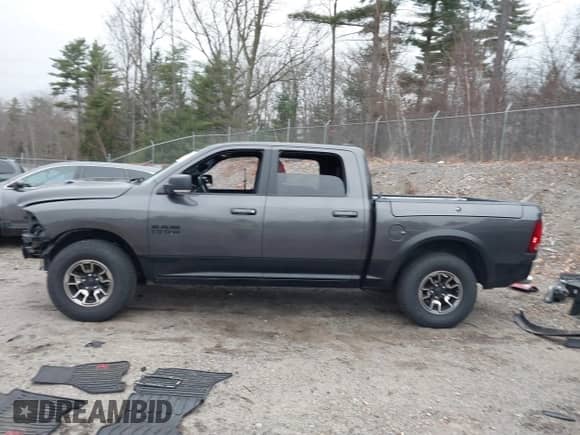 2018 Ram 1500 Rebel z VIN 1C6RR7YT2JS134820, wystawiony jako IAAI lot #40931182 z przebiegiem 56 427 mil mil oraz . Historia ofert i sprzedaży dostępna na DreamBid. Obrazek 15.