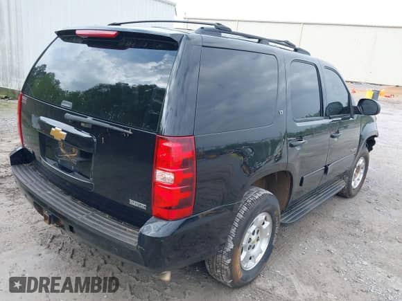 2012 Chevrolet Tahoe LT with VIN 1GNSCBE09CR222631, listed as a IAAI auction lot 41889997 with 166,138 mi miles and . Bid and sale history available at DreamBid. Image 4.
