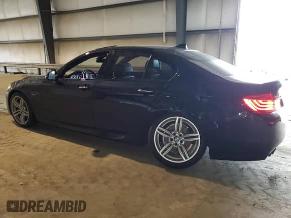 2015 BMW 5 Series 535d xDrive with VIN WBAFV3C51FD686441, listed as a Copart auction lot 79429274 with 67,193 mi miles and Salvage title. Bid and sale history available at DreamBid. Image 2.