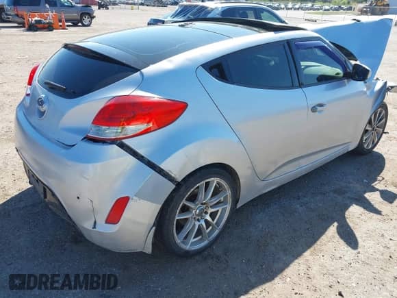 2012 Hyundai Veloster w/Black Int z VIN KMHTC6ADXCU036070, wystawiony jako IAAI lot #41779990 z przebiegiem Nie podano mil oraz . Historia ofert i sprzedaży dostępna na DreamBid. Obrazek 4.