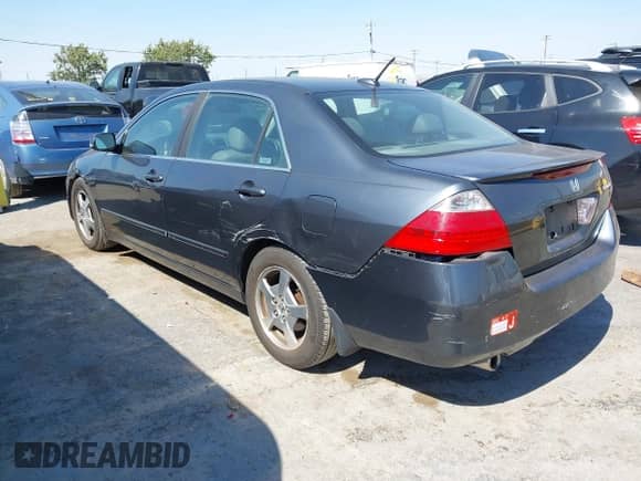 2007 Honda Accord with VIN JHMCN36417C002907, listed as a IAAI auction lot 42748821 with 135,081 mi miles and . Bid and sale history available at DreamBid. Image 3.