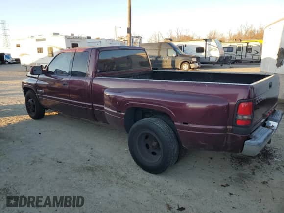 2001 Dodge 3500 с VIN 1B7MC33671J599792, выставлен на аукционе Copart как лот 80102234 с пробегом 261 354 миль миль и Списание • Salvage title. История ставок и продаж доступна на DreamBid. Изображение 2.