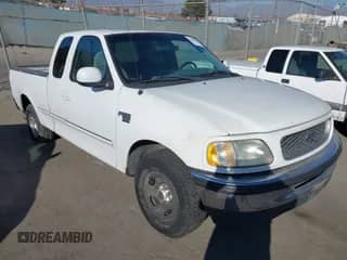 1998 Ford F-150 with VIN 2FTZX1764WCA42109, listed as a IAAI auction lot 43409593 with 249,476 mi miles and . Bid and sale history available at DreamBid. Image 1.