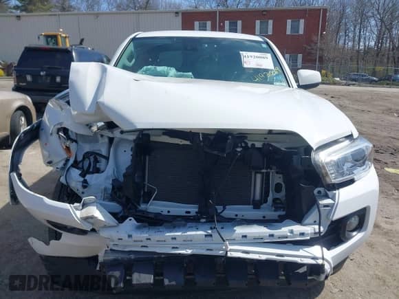 2021 Toyota Tacoma SR5 z VIN 3TMDZ5BN4MM118505, wystawiony jako IAAI lot #41920089 z przebiegiem 30 693 mil mil oraz . Historia ofert i sprzedaży dostępna na DreamBid. Obrazek 12.