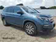 2021 Honda Pilot EX with VIN 5FNYF5H35MB014240, listed as a Copart auction lot 63614555 with 122,078 mi miles and Salvage title. Bid and sale history available at DreamBid. Image 4.