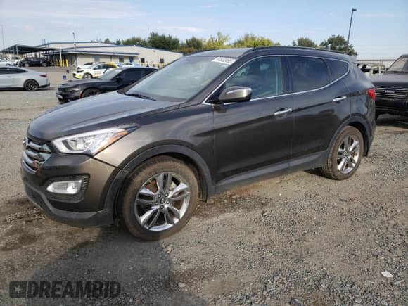2014 Hyundai Santa Fe z VIN 5XYZUDLA6EG215861, wystawiony jako Copart lot #81632495 z przebiegiem 99 576 mil mil oraz Szkoda całkowita • Salvage title. Historia ofert i sprzedaży dostępna na DreamBid. Obrazek 1.