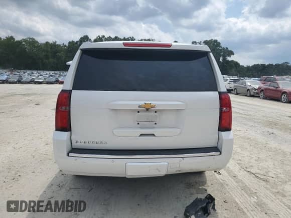 2016 Chevrolet Suburban LTZ with VIN 1GNSKJKCXGR207606, listed as a Copart auction lot 70943125 with 169,007 mi miles and Salvage title. Bid and sale history available at DreamBid. Image 6.