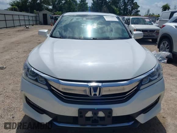 2017 Honda Accord EX-L with VIN 1HGCR2F94HA006962, listed as a IAAI auction lot 42539217 with 125,163 mi miles and . Bid and sale history available at DreamBid. Image 12.