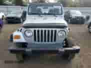 2005 Jeep Wrangler X with VIN 1J4FA39S35P323755, listed as a Copart auction lot 81223145 with 150,964 mi miles and Salvage title. Bid and sale history available at DreamBid. Image 5.