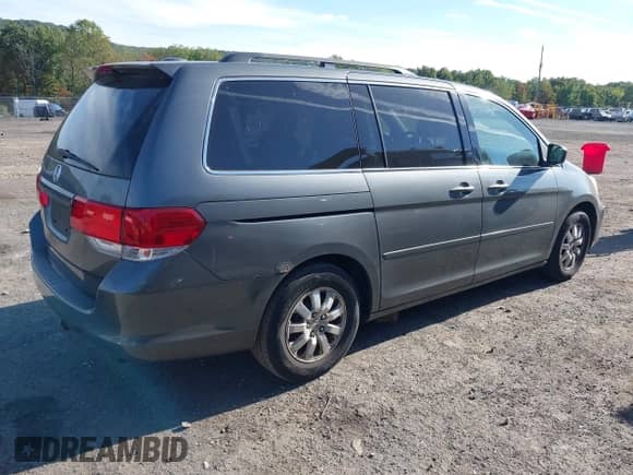 2008 Honda Odyssey EX-L with VIN 5FNRL38698B066732, listed as a IAAI auction lot 43359643 with 207,623 mi miles and . Bid and sale history available at DreamBid. Image 4.