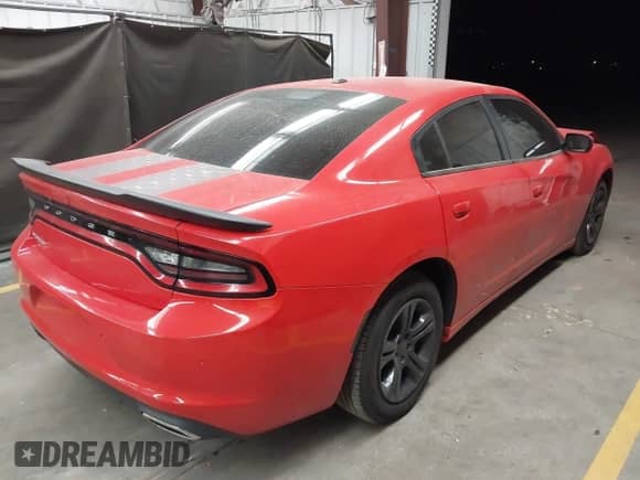 2021 Dodge Charger SXT with VIN 2C3CDXBG3MH646708, listed as a IAAI auction lot 43347842 with 83,286 mi miles and . Bid and sale history available at DreamBid. Image 4.
