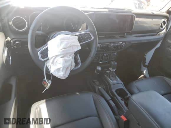 2024 Jeep Wrangler Sahara z VIN 1C4RJXP65RW192128, wystawiony jako Copart lot #66761135 z przebiegiem 16 491 mil mil oraz Szkoda całkowita • Salvage title. Historia ofert i sprzedaży dostępna na DreamBid. Obrazek 8.