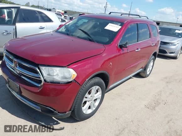 2013 Dodge Durango Crew with VIN 1C4SDJDT5DC565632, listed as a IAAI auction lot 43414719 with 130,151 mi miles and . Bid and sale history available at DreamBid. Image 2.