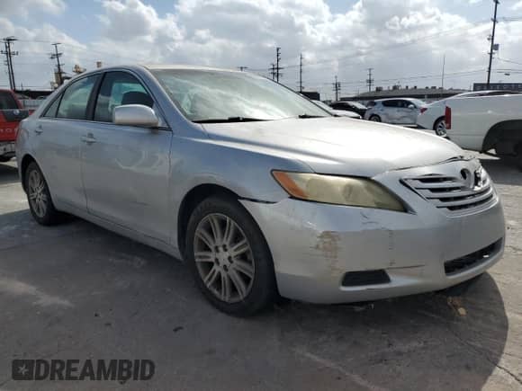2007 Toyota Camry LE with VIN 4T1BK46K77U009540, listed as a Copart auction lot 82472495 with 189,736 mi miles and Salvage title. Bid and sale history available at DreamBid. Image 4.