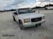 1994 GMC Sierra 1500 z VIN 1GTDC14Z1RZ501012, wystawiony jako Copart lot #68832095 z przebiegiem 94 450 mil mil oraz Szkoda całkowita • Salvage title. Historia ofert i sprzedaży dostępna na DreamBid. Obrazek 13.