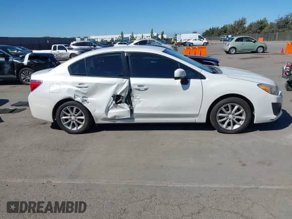 2013 Subaru Impreza Premium with VIN JF1GJAC64DH036384, listed as a IAAI auction lot 43260148 with 122,446 mi miles and . Bid and sale history available at DreamBid. Image 13.