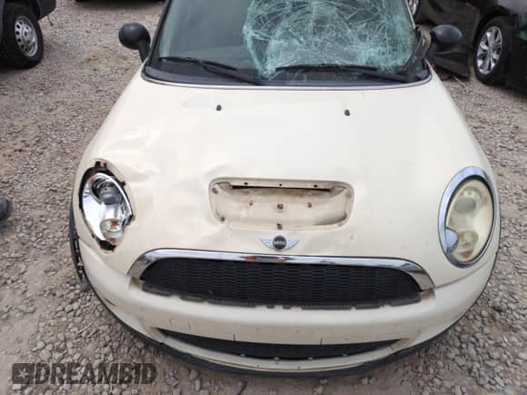 2009 MINI Hardtop S with VIN WMWMF73569TW87347, listed as a Copart auction lot 59445035 with 118,336 mi miles and Salvage title. Bid and sale history available at DreamBid. Image 11.