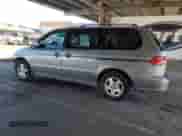 2001 Honda Odyssey EX with VIN 2HKRL18621H606756, listed as a Copart auction lot 85207295 with 301,823 mi miles and Salvage title. Bid and sale history available at DreamBid. Image 2.