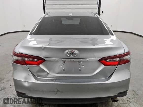 2022 Toyota Camry LE с VIN 4T1C11AK7NU665263, выставлен на аукционе Copart как лот 83995045 с пробегом 79 146 миль миль и Чистый • Clean title. История ставок и продаж доступна на DreamBid. Изображение 6.