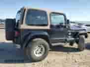 1999 Jeep Wrangler Sahara z VIN 1J4FY49S9XP479545, wystawiony jako Copart lot #54753745 z przebiegiem 34 642 mil mil oraz Szkoda całkowita • Salvage title. Historia ofert i sprzedaży dostępna na DreamBid. Obrazek 3.