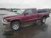 2003 Dodge Dakota SLT z VIN 1D7HG42N03S317953, wystawiony jako Copart lot #72736414 z przebiegiem 280 504 mil mil oraz Szkoda całkowita • Salvage title. Historia ofert i sprzedaży dostępna na DreamBid. Obrazek 1.
