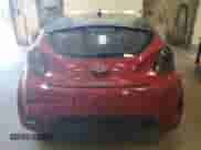 2012 Hyundai Veloster w/Red Int z VIN KMHTC6AD0CU027782, wystawiony jako Copart lot #81558205 z przebiegiem 104 484 mil mil oraz Szkoda całkowita • Salvage title. Historia ofert i sprzedaży dostępna na DreamBid. Obrazek 6.