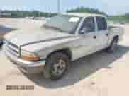 2001 Dodge Dakota Sport z VIN 1B7GL2AN81S101420, wystawiony jako IAAI lot #42387985 z przebiegiem 316 658 mil mil oraz . Historia ofert i sprzedaży dostępna na DreamBid. Obrazek 2.