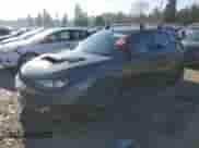 2009 Subaru WRX STI with VIN JF1GR896X9L802972, listed as a Copart auction lot 87186164 with 160,838 mi miles and Salvage title. Bid and sale history available at DreamBid. Image 1.