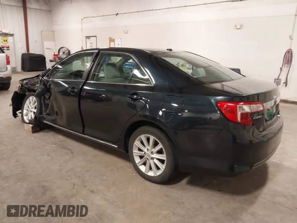2013 Toyota Camry XLE with VIN 4T1BD1FK5DU097069, listed as a IAAI auction lot 43052279 with 90,257 mi miles and . Bid and sale history available at DreamBid. Image 3.
