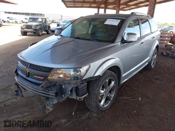 2017 Dodge Journey Crossroad with VIN 3C4PDCGB8HT605409, listed as a IAAI auction lot 43145174 with 140,909 mi miles and . Bid and sale history available at DreamBid. Image 2.