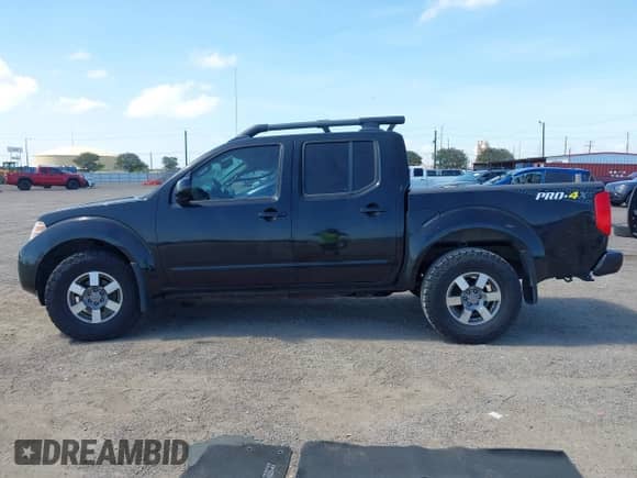2013 Nissan Frontier SV with VIN 1N6AD0EV2DN748946, listed as a IAAI auction lot 42812480 with 164,545 mi miles and . Bid and sale history available at DreamBid. Image 14.