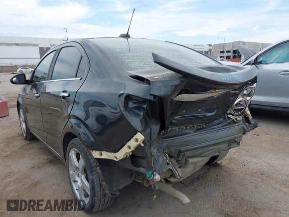 2015 Chevrolet Sonic LTZ with VIN 1G1JE5SB3F4101447, listed as a IAAI auction lot 42964440 with 148,815 mi miles and . Bid and sale history available at DreamBid. Image 6.