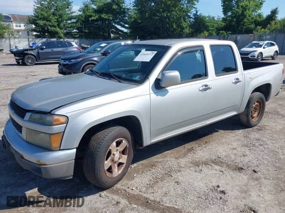 2010 Chevrolet Colorado 1LT z VIN 1GCDSCDE7A8140360, wystawiony jako IAAI lot #42660572 z przebiegiem 147 641 mil mil oraz . Historia ofert i sprzedaży dostępna na DreamBid. Obrazek 17.