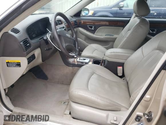 2005 Hyundai XG с VIN KMHFU45E65A401379, выставлен на аукционе Copart как лот 59857775 с пробегом 189 044 миль миль и Списание • Salvage title. История ставок и продаж доступна на DreamBid. Изображение 7.