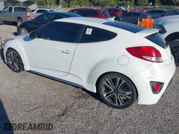 2016 Hyundai Veloster Turbo с VIN KMHTC6AE8GU273333, выставлен на аукционе IAAI как лот 43472469 с пробегом 111 089 миль миль и . История ставок и продаж доступна на DreamBid. Изображение 3.
