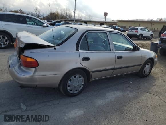 1999 Chevrolet Prizm z VIN 1Y1SK5484XZ401262, wystawiony jako Copart lot #78032974 z przebiegiem 161 904 mil mil oraz Szkoda całkowita • Salvage title. Historia ofert i sprzedaży dostępna na DreamBid. Obrazek 3.