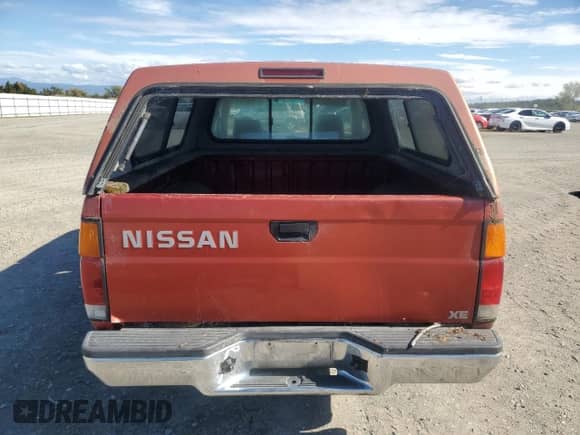 1997 Nissan Frontier XE with VIN 1N6SD16S4VC395458, listed as a Copart auction lot 85908625 with 220,913 mi miles and Clean title. Bid and sale history available at DreamBid. Image 6.