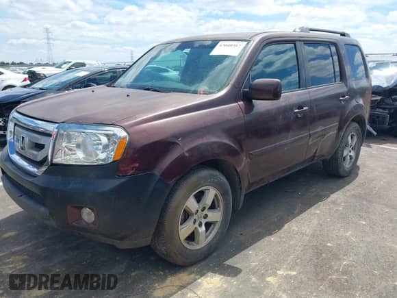 2010 Honda Pilot EX with VIN 5FNYF3H41AB002627, listed as a IAAI auction lot 43040317 with 172,545 mi miles and . Bid and sale history available at DreamBid. Image 2.