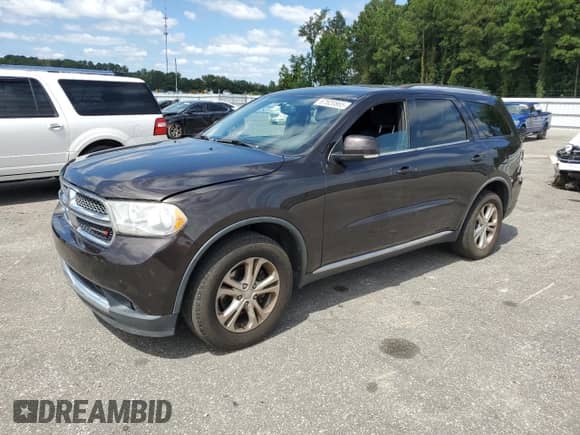 2012 Dodge Durango Crew with VIN 1C4RDHDG4CC284902, listed as a Copart auction lot 67820865 with 202,125 mi miles and Salvage title. Bid and sale history available at DreamBid. Image 1.