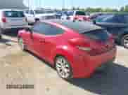 2012 Hyundai Veloster w/Gray Int z VIN KMHTC6AD1CU051606, wystawiony jako IAAI lot #43436964 z przebiegiem 144 149 mil mil oraz . Historia ofert i sprzedaży dostępna na DreamBid. Obrazek 3.